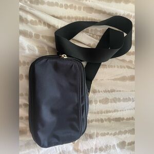 H&M black crossbody/sling/belt bag with 2 compartments. In great condition.